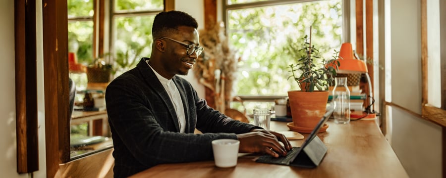 Adult man making sure his resume is well-written